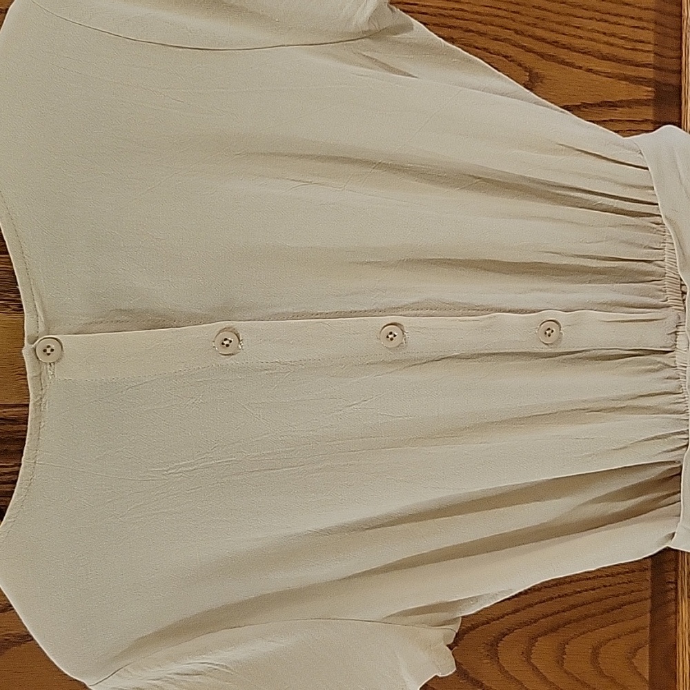 This is a womens linen jumpsuit in a tan color, size large. - Picture 4 of 4
